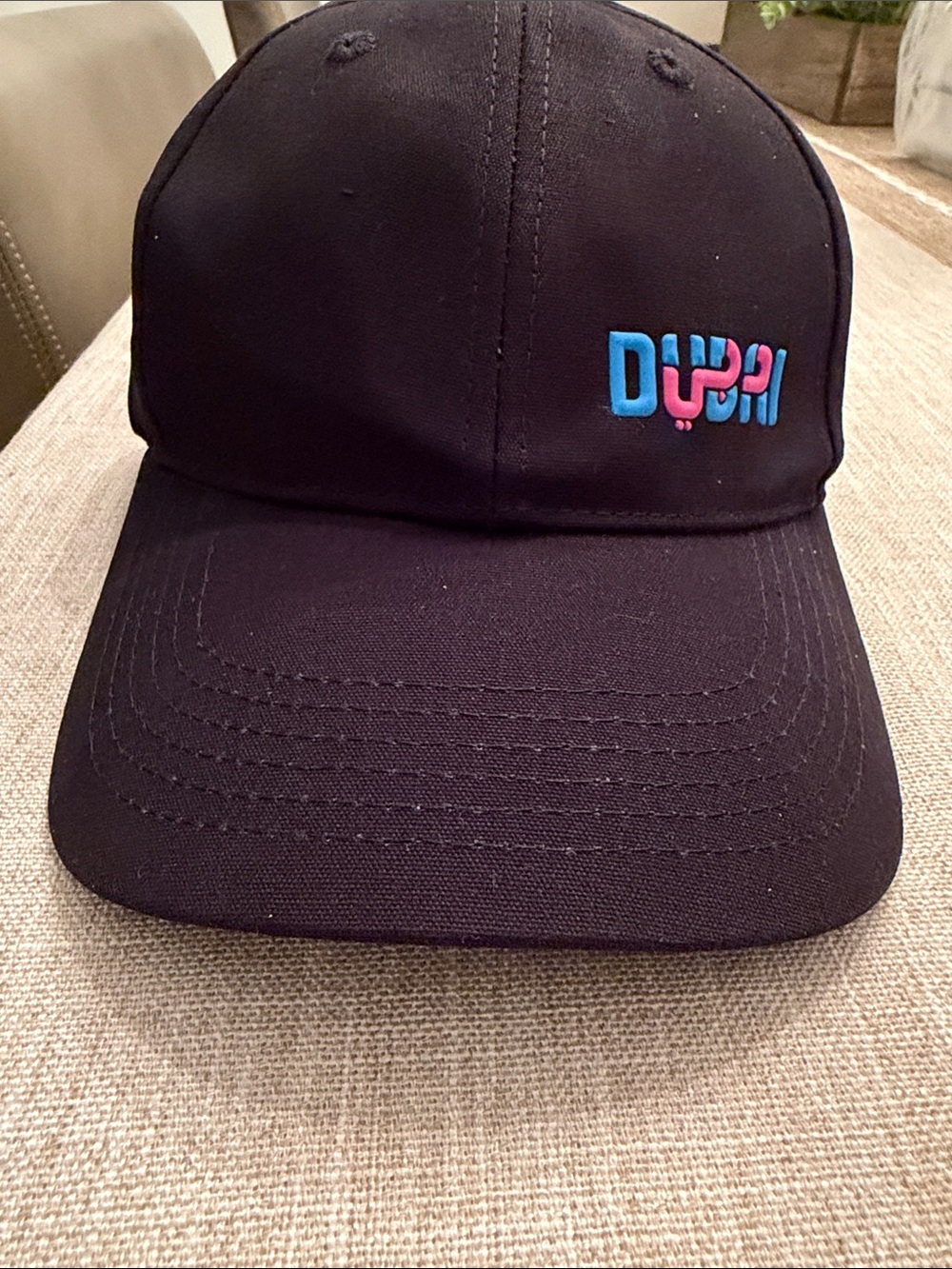 Black Baseball Cap with “Dubai” in Blue & Pink